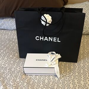 Chanel Black Bag with White Box and Ribbon